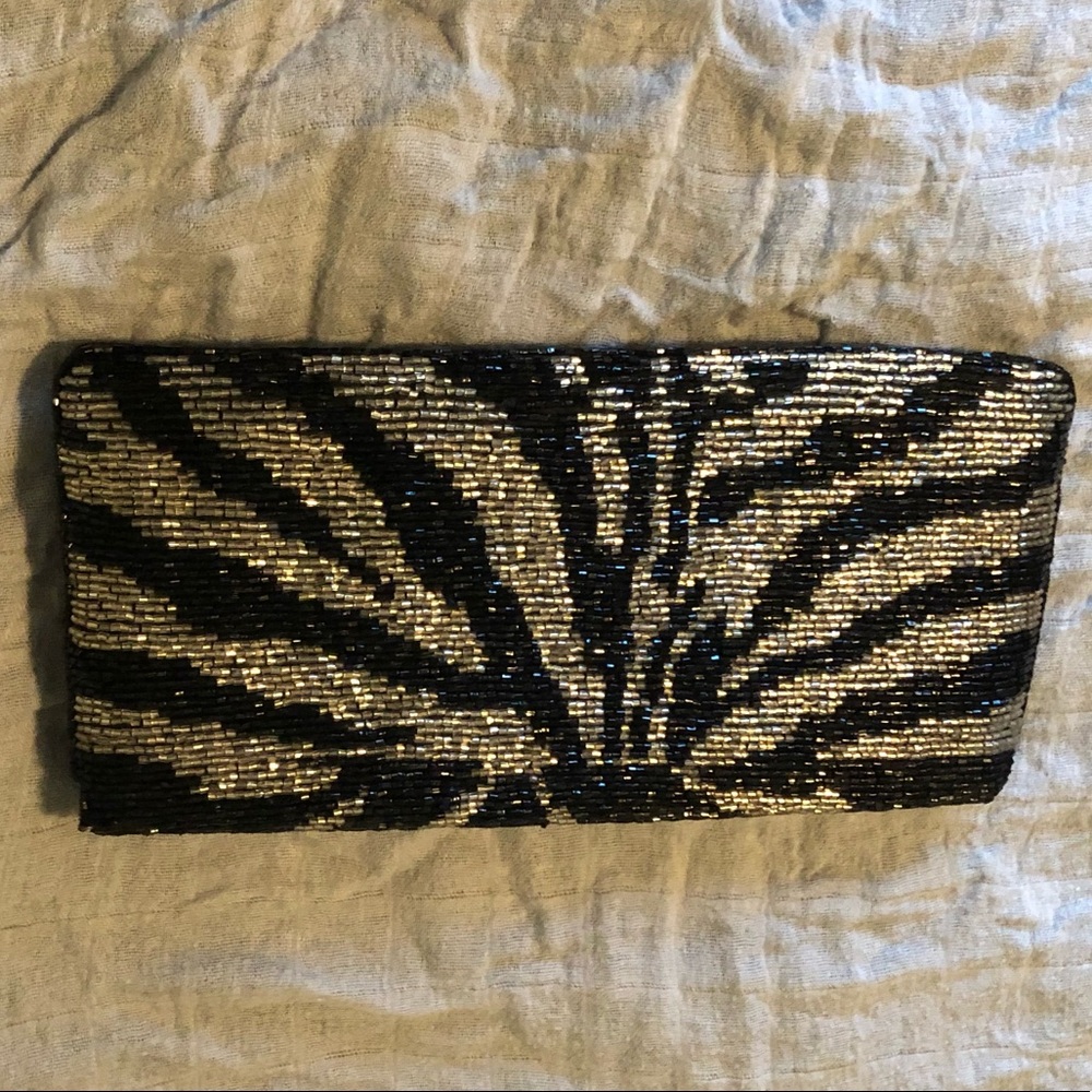 Neumann Marcus zebra print clutch wallet